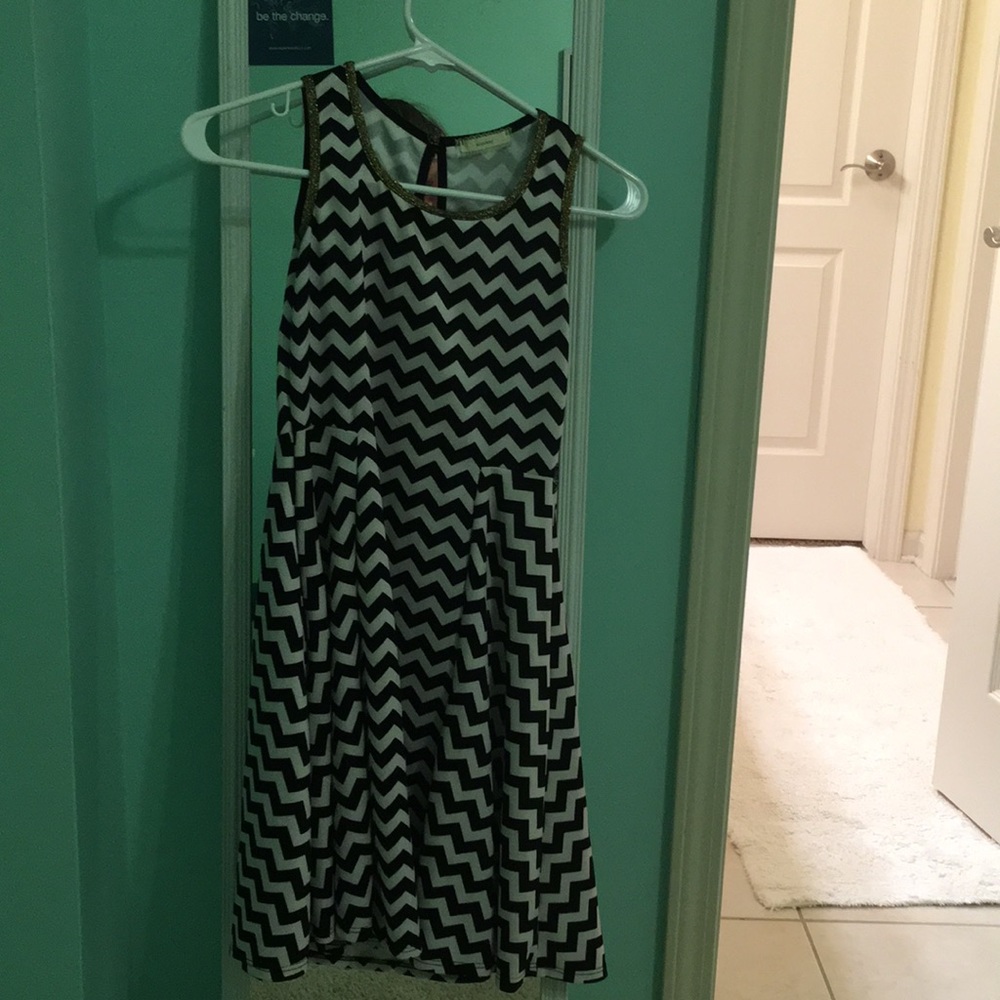 Chevron striped dress w/ gold trim around sleeves